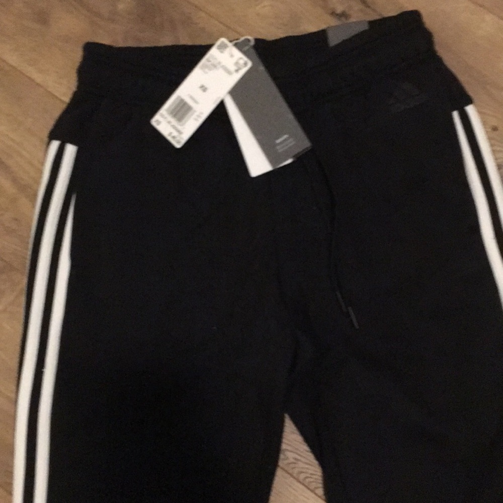 Brand new black adidas joggers